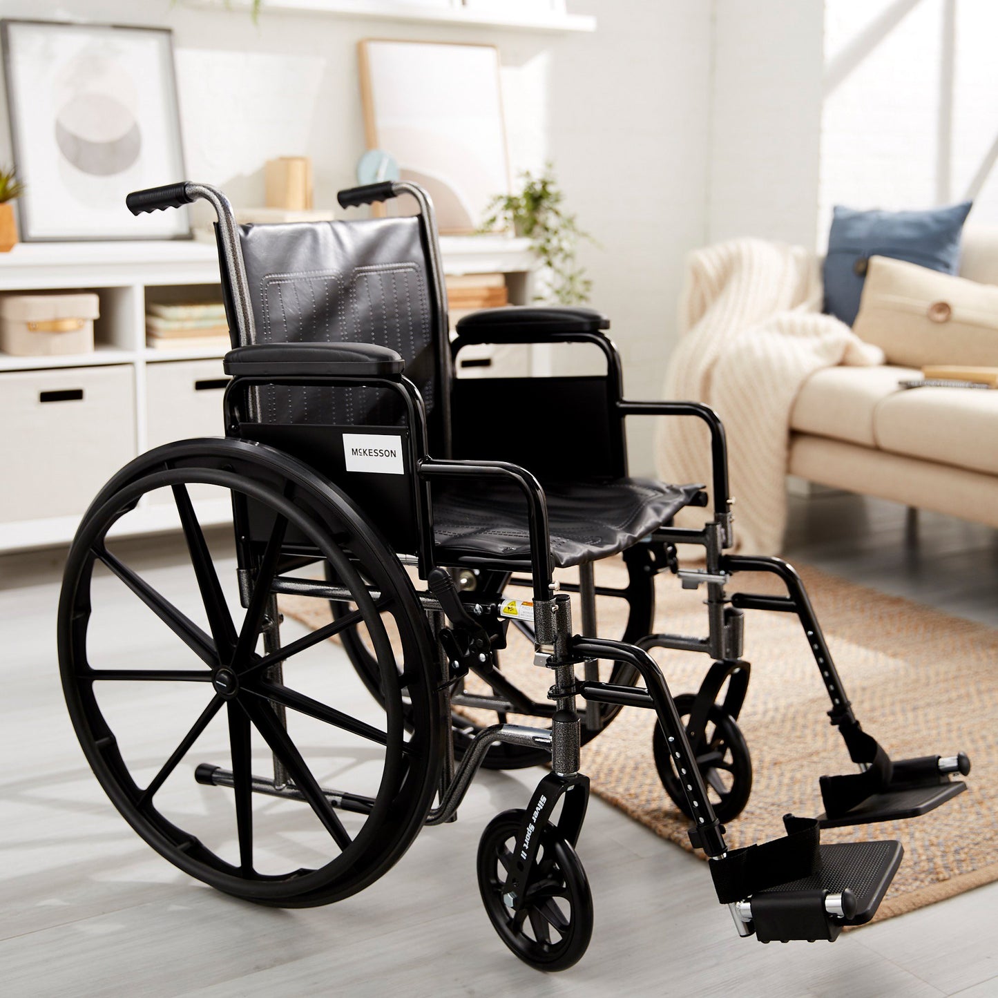 Wheelchair McKesson Dual Axle Desk Length Arm Swing-Away Footrest Black Upholstery 18 Inch Seat Width Adult 300 lbs. Weight Capacity - 146-SSP218DDA-S