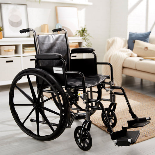 Wheelchair McKesson Dual Axle Desk Length Arm Swing-Away Footrest Black Upholstery 18 Inch Seat Width Adult 300 lbs. Weight Capacity - 146-SSP218DDA-S